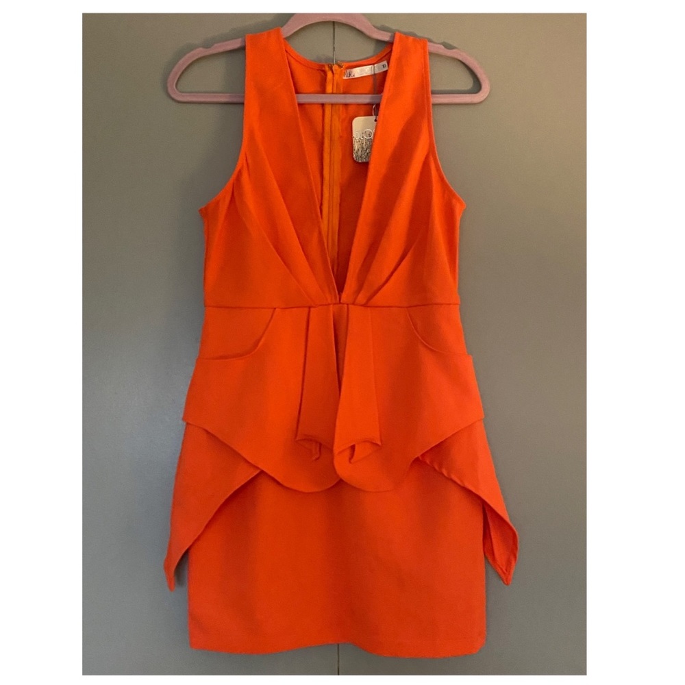 Brand new peplum mini dress.